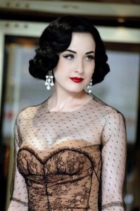 dita von teese wearing pearl earrings